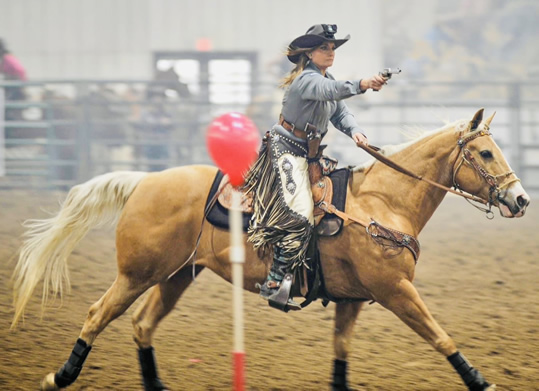 Heather Competeting in Cowboy Mounted Shooting (CMSA)